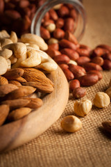 mix of nuts on a wooden table