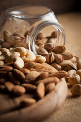 mix of nuts on a wooden table