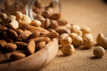 mix of nuts on a wooden table