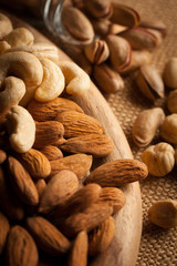 mix of nuts on a wooden table