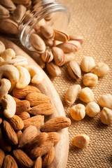 mix of nuts on a wooden table