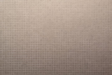 Vintage grey bown and the small tile wall background texture.