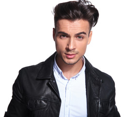 Obraz premium young smart casual man wearing leather jacket and shirt