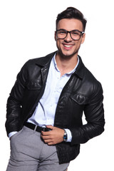 portrait of smiling businessmans standing with hands in pockets