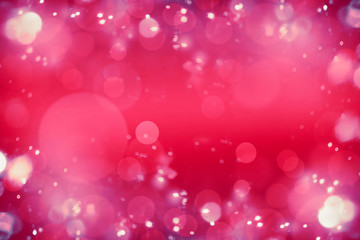 Obraz na płótnie Canvas Bright pink red bokeh background. Blurred abstract holiday or event background.