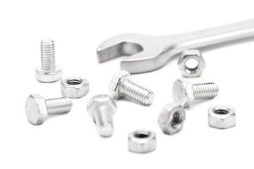 Bolts, nuts and wrench isolate.