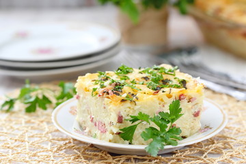 Homemade pasta baked with ham and cheese