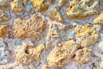 Texture Background of Stony Wall on Old Venetian Port in Crete in Greece