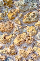Texture Background of Stony Wall on Old Venetian Port in Crete in Greece