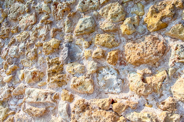 Texture Background of Stony Wall on Old Venetian Port in Crete in Greece