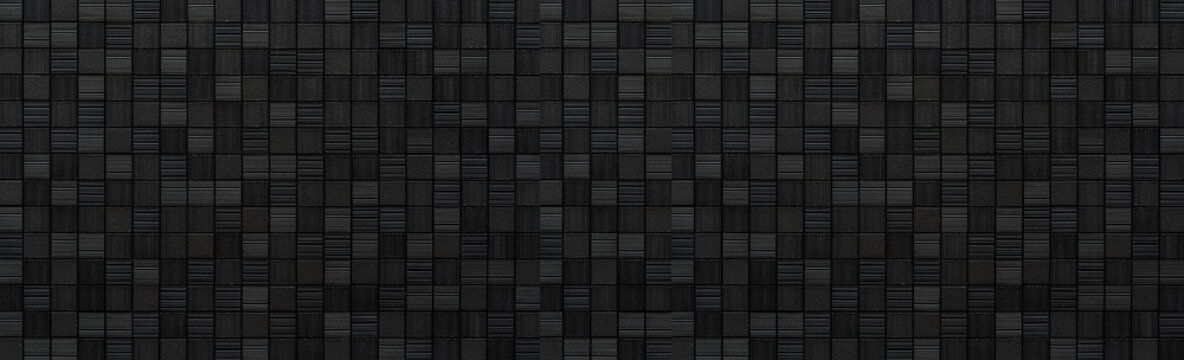 Panorama of black brick wall background seamless