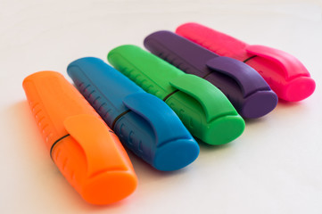 A set of colored markers for the Board.