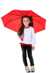 Little girl under an umbrella.