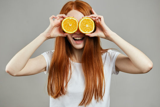 glasses from aranges. close up photo. happy mood. emotion and feeling . scin care
