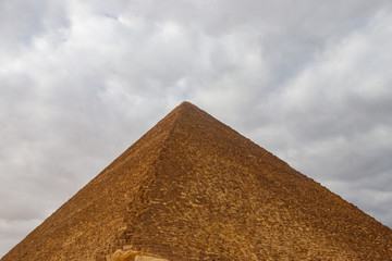 Fototapeta na wymiar Great Pyramid of Giza (also known as the Pyramid of Khufu or the Pyramid of Cheops) is the oldest and largest of the three pyramids in the Giza pyramid complex