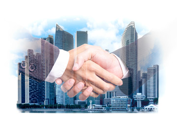 Double exposure businessman handshake on modern city  building financial district and commercial ,Business partnership successful and strategic plan concept