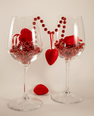 Wine glasses with hearts and red beads