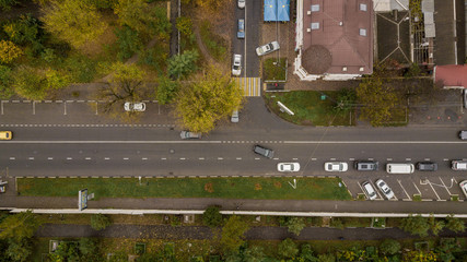 Top down view of buildings, street roads with cars in Krasnodar city, Russia