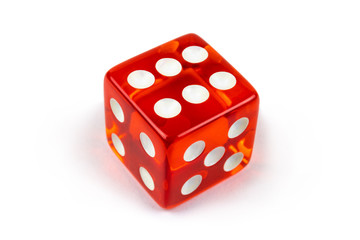 Red glass game dice closeup isolated on white. Six with shadow.