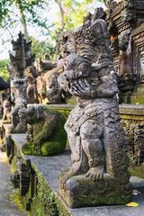 Fototapeta na wymiar Statue in monkey forest of ubud, bali