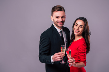 Together forever with love. Elegant stylish happy couple with champagne in hands