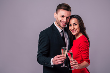 Together forever with love. Elegant stylish happy couple with champagne in hands