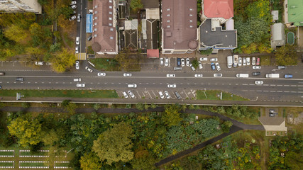 Top down view of buildings, street roads with cars in Krasnodar city, Russia