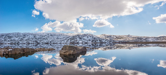Panorama of Snow Covered Mountains and Lagoa Comprida, a Lake In Serra da Estrela Natural Park in...