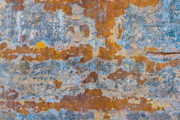 Rusted stone wall. Aged mediterranean stone wall. Medieval architecture.