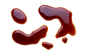 Splashes of soy sauce isolated on white background