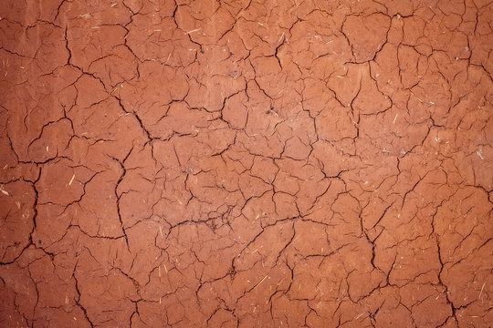 Texture Cracked Clay Surface. Adobe African Buildind Wall