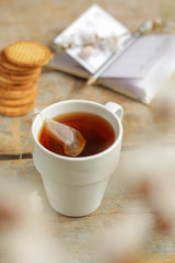 tea, hot drink (against the background of flowers). copy space