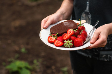 ice cream and red strawberries (dessert) - berries are ripe, juicy. copy space. top