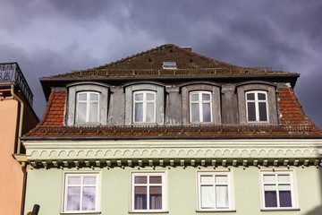 historical city facades on a stormy day
