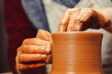 Potter makes a jug