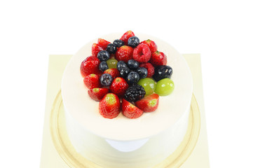 fruit birthday cake isolated on white background