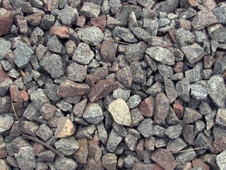 Gray stones are lying on the ground