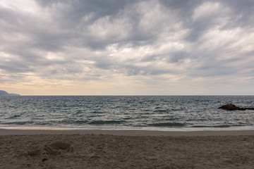the boundless sea seen from the beach