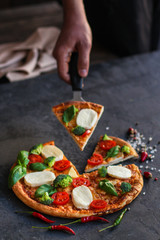 pizza vegetables and cheese (broccoli, mozzarella basil and others). food background