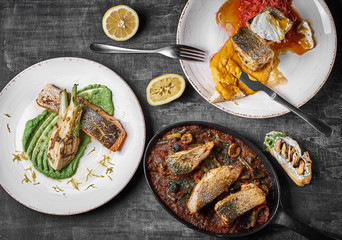 Three-course fish platter Pike perch, salmon steak, Stewed perch.. Dietary menu. Fish menu. Seafood. Concept of healthy food.