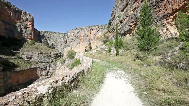 path to Our Lady of Jaraba Sanctuary at Barranco de la Hoz Seca canyon next to Jaraba town, province of Zaragoza, Aragon, Spain
