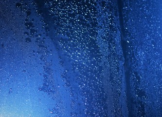 Fototapeta na wymiar Blue water drops background