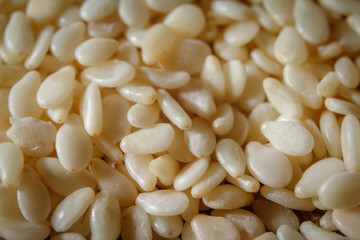 Sesame seeds background. Extreme macro photography.