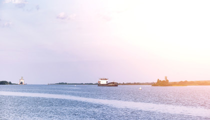 Landscape lake. Texture of water. The lake is at dawn. The mouth of the river at the confluence of...