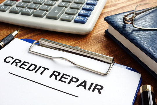 Credit repair form in a clipboard. Bad credit score.