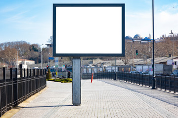 Blank white mockup of billboard in empty Istanbul street