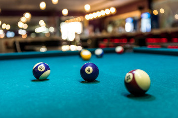 Selective focus on billiard balls on the table