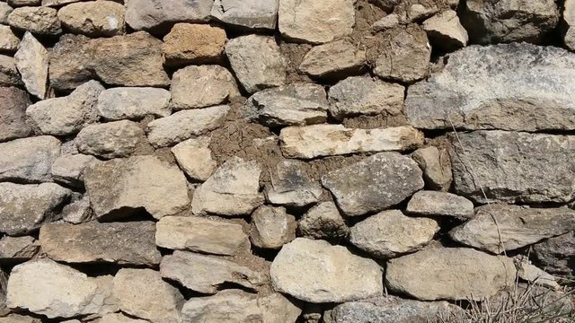 The stone fence is made of crude stone (limestone) on loam mortar. The millennial ancient methods of construction, history of the building

