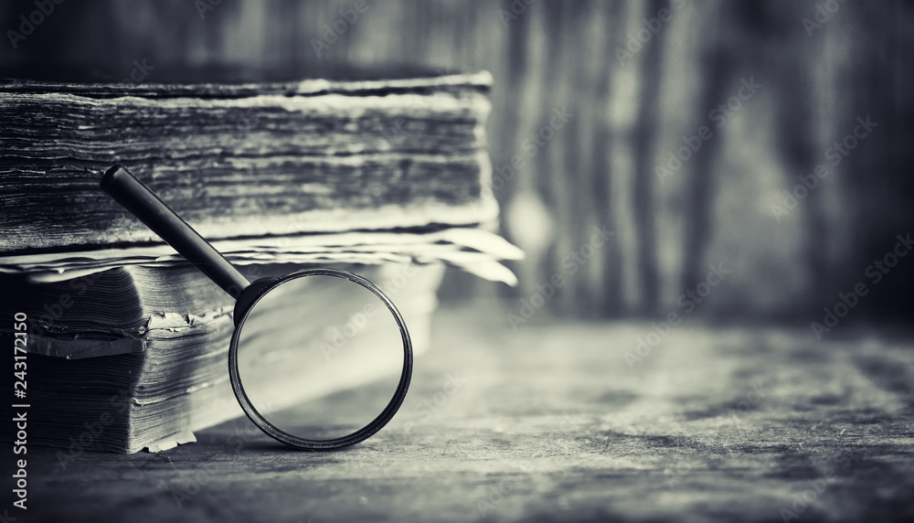 Canvas Prints an old retro book on the table. an encyclopedia of the past on an old wooden countertop. an old book