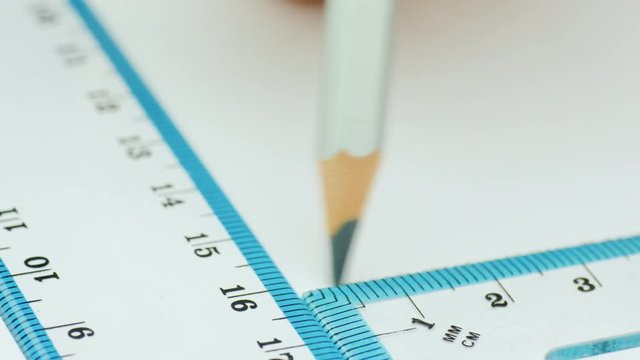 Draw parallel lines on a drawing with a ruler and a triangle
